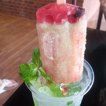 Ice cream popsicle in a drink